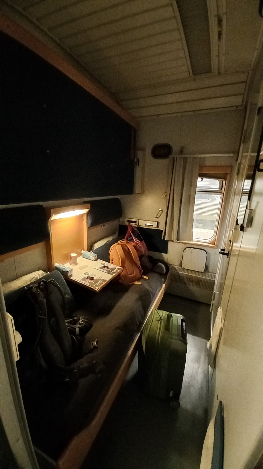Cozy train sleeper cabin! Second bed folds out and acts as a bunk.