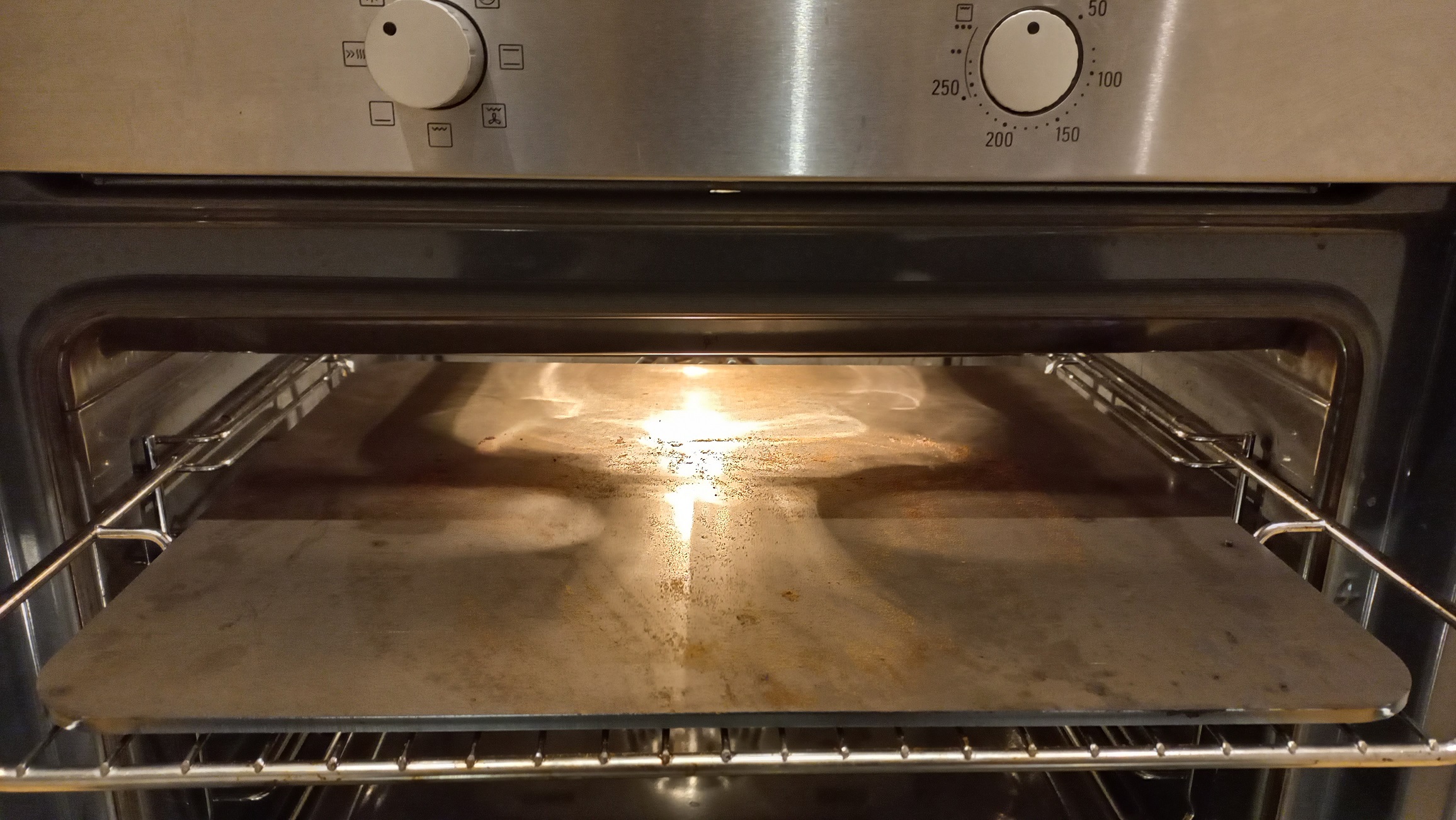 The steel setup. Top shelf of oven with grill turned on for max heat ouput