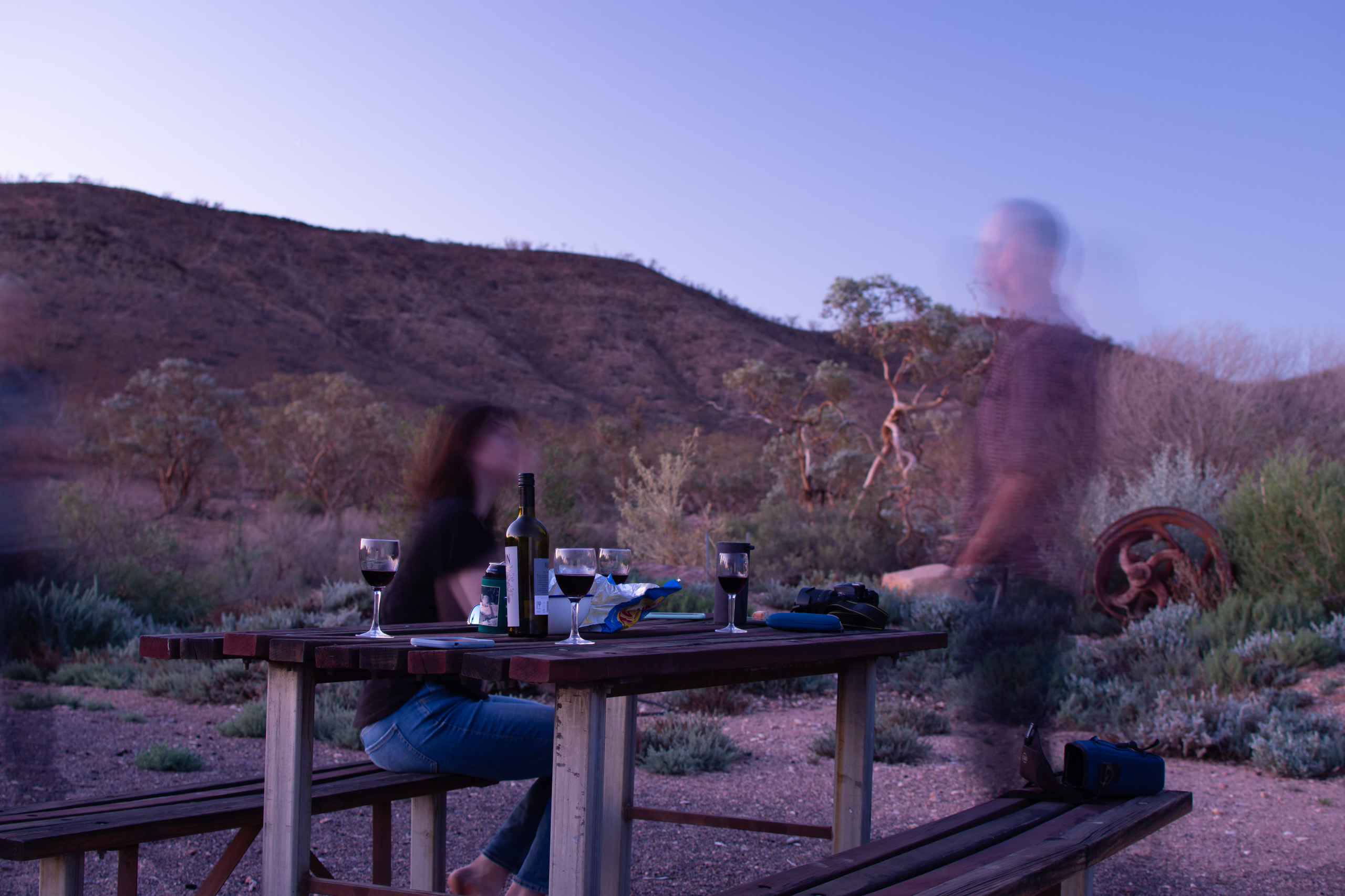 Enjoying wine, snacks, and company. © 2024. This work is openly licensed via CC BY-NC 4.0