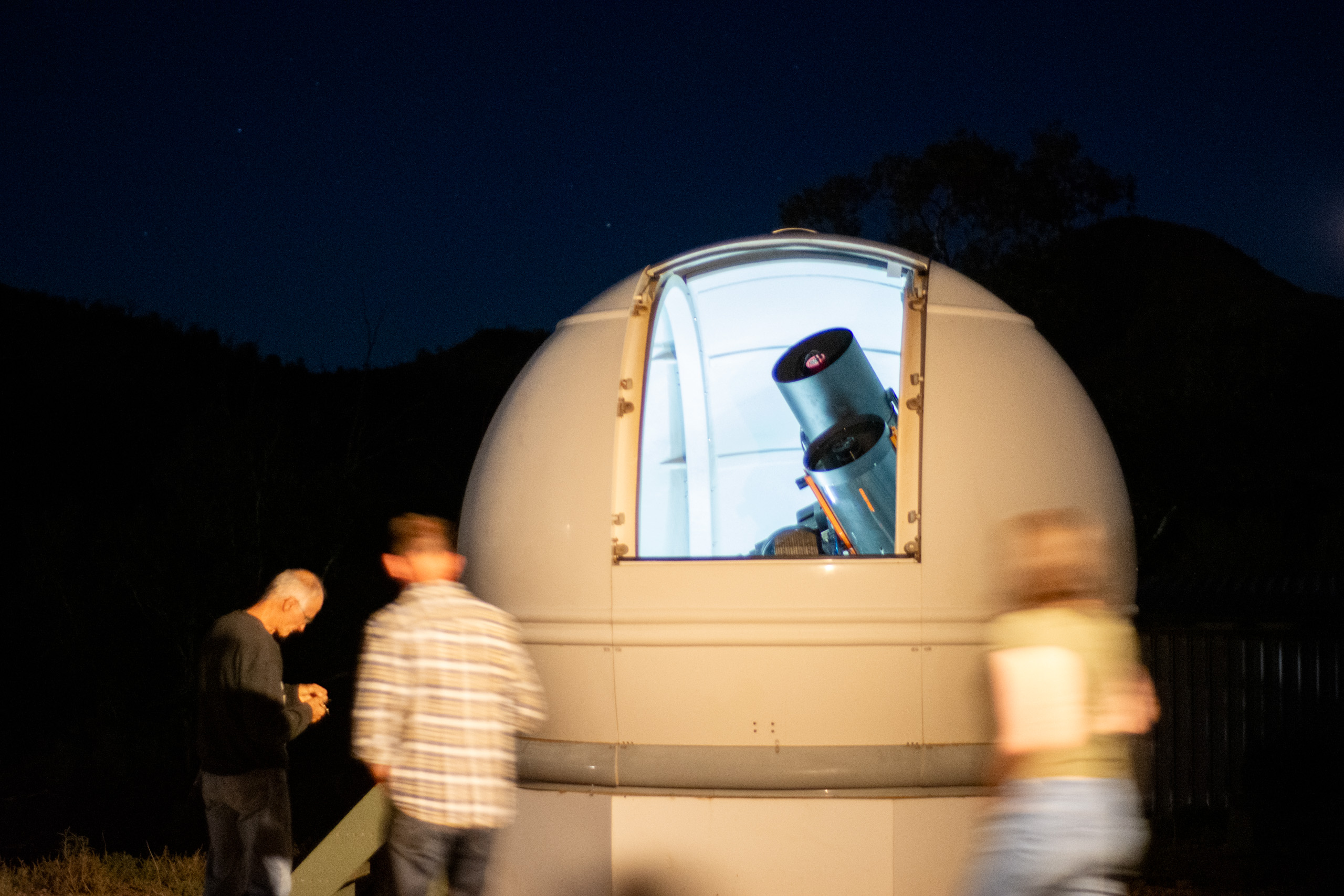 Doug and the impressive telescope! © 2024. This work is openly licensed via CC BY-NC 4.0