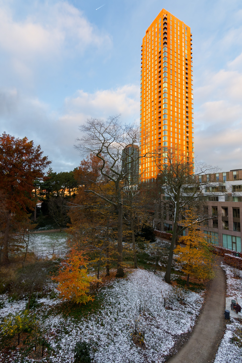 Sunrise on the tower outside our apartment. The cladding is oxidized iron, so its natural red hue is absolutely vivid with sunrise’s cast. © 2024. This work is openly licensed via CC BY-NC 4.0